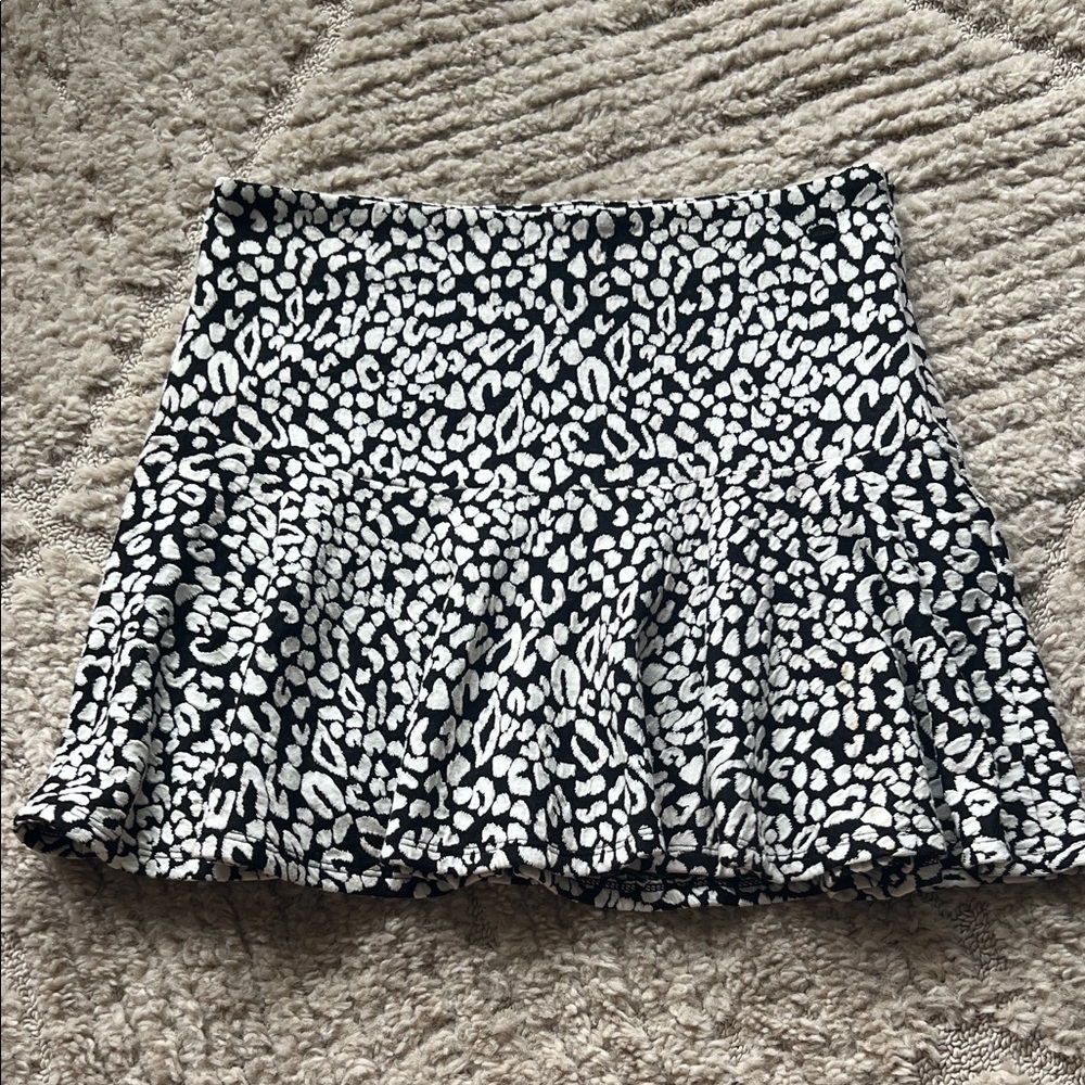 Guess Black and White Animal Print Mini Skirt with Ruffle Bottom